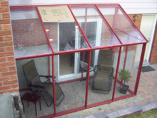 DIY temporary sun room with plastic shower curtain "windows 