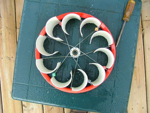 This turbine is made by cutting apart PVC pipes so that the halves are 
